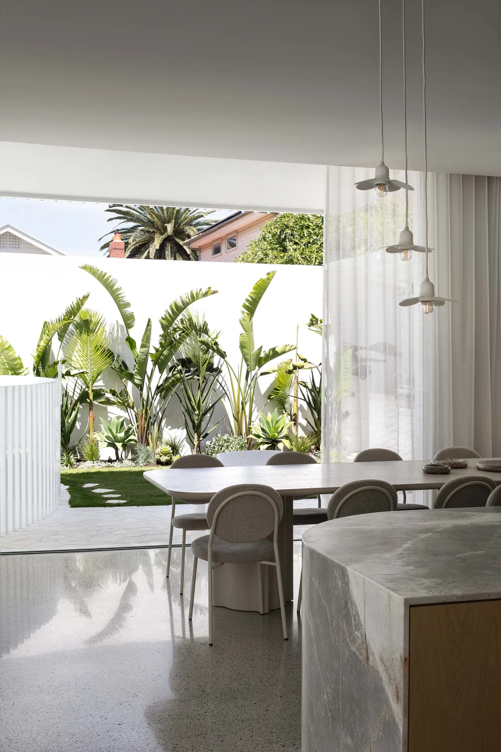 Alba House dining room with garden view